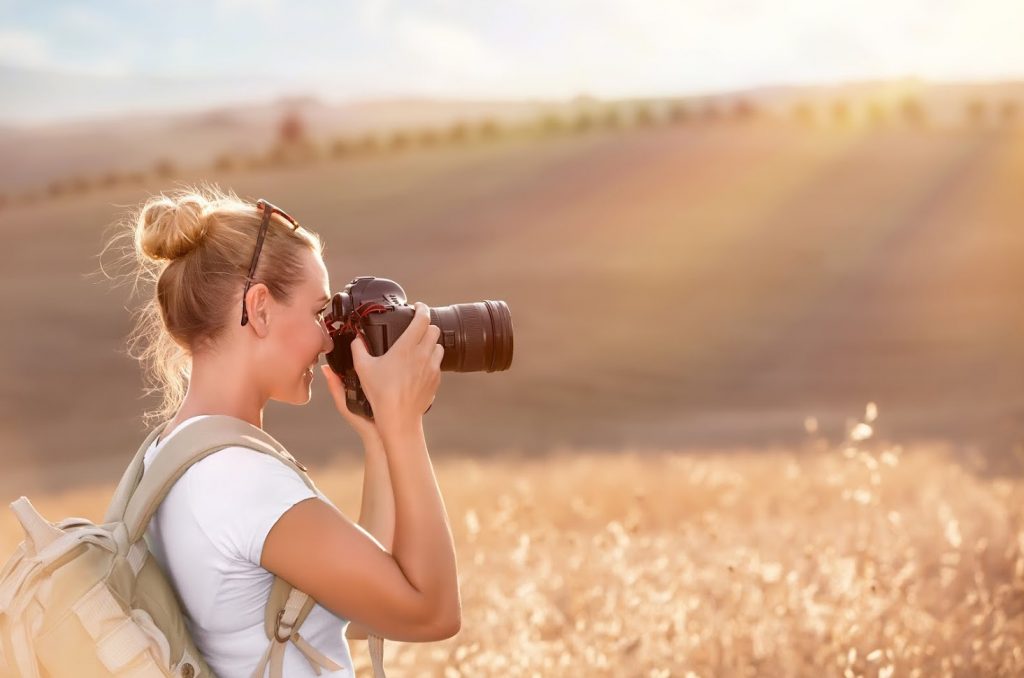 Young Photographer in a Field