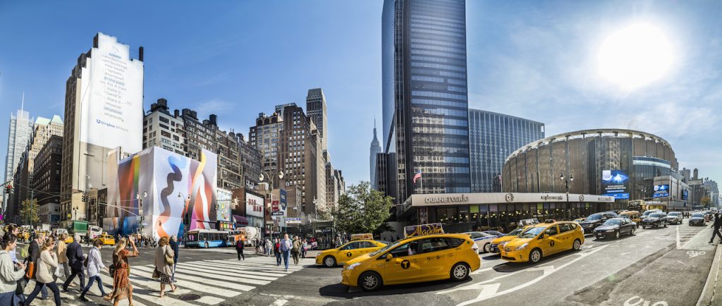 panorama view of busy street on Madison Square Garden