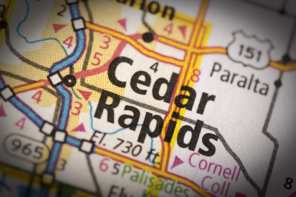 Closeup of Cedar Rapids Iowa on a road map of the United States.