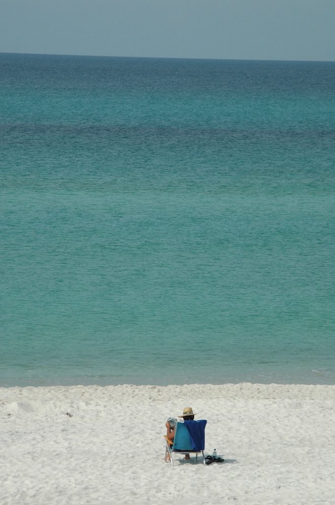 Person sitting in beach chair in the sand at Beaches of South Walton Florida 2008 ** Note: Slight blurriness, best at smaller sizes