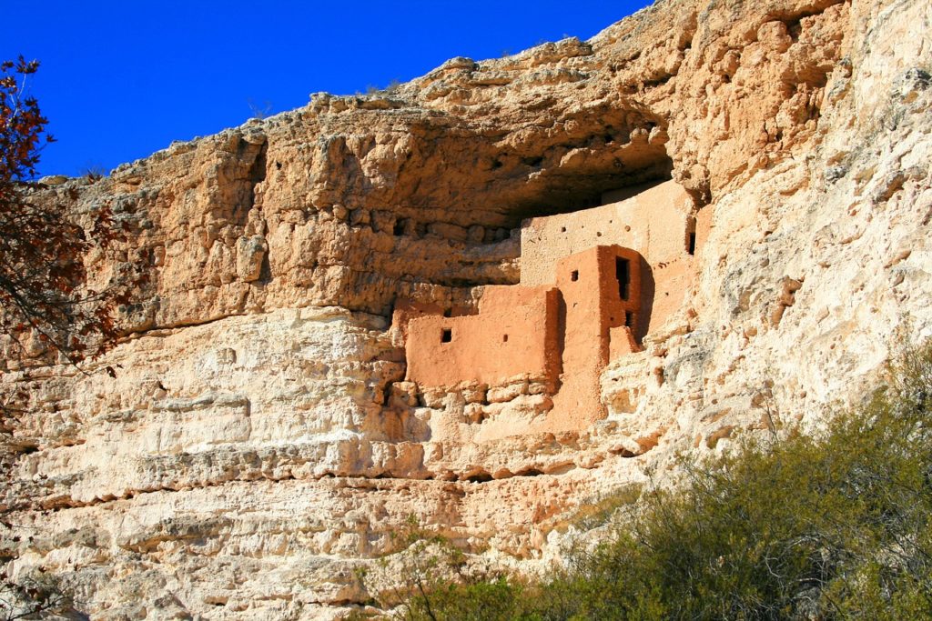 front of Montezuma Castle National Monument on a sunny day